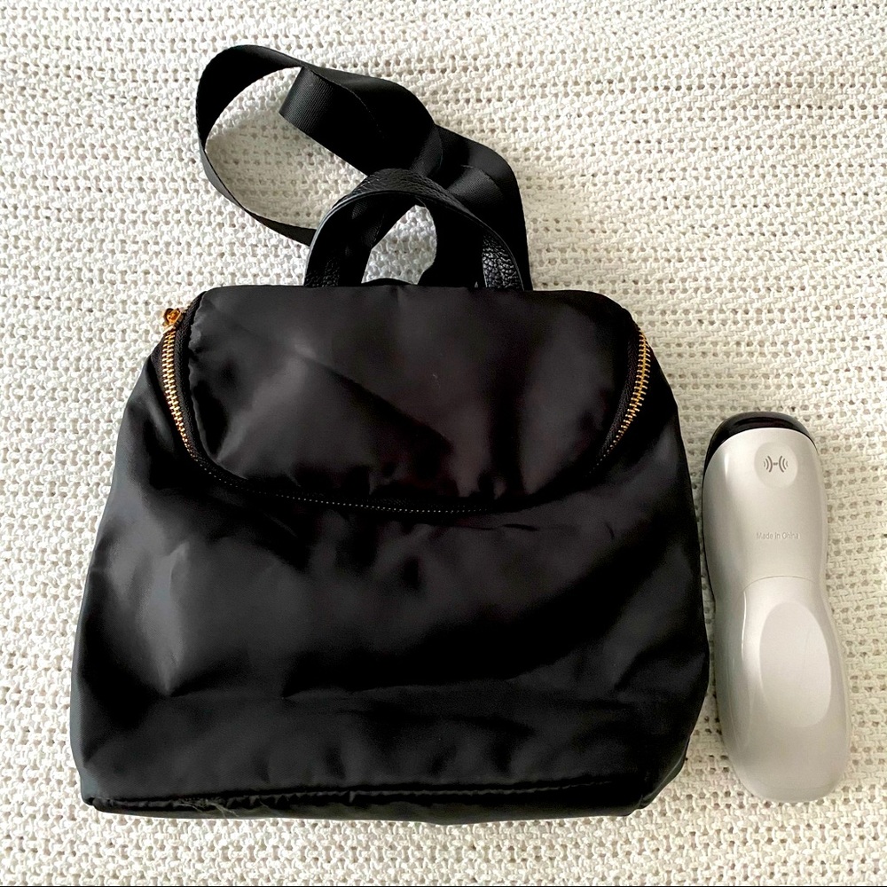 Mini backpack. Water resistant. Never used.